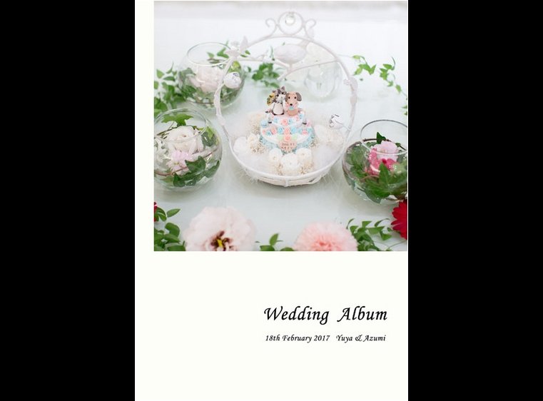可愛らしいリングピローの表紙、ページをめくるとお支度のシーンから始まります。1頁目：結婚式アルバム